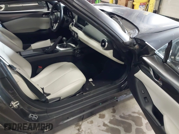 2021 Mazda MX-5 Miata Grand Touring with VIN JM1NDAM73M0451484, listed as a IAAI auction lot 41485044 with 11,328 mi miles and . Bid and sale history available at DreamBid. Image 8.
