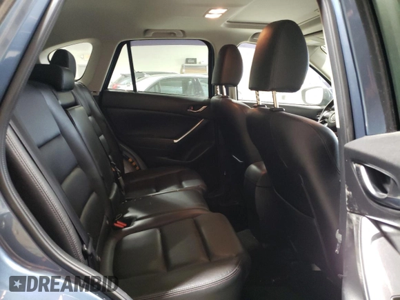 2016 Mazda CX-5 Grand Touring with VIN JM3KE4DY1G0714674, listed as a Copart auction lot 75516524 with 115,766 mi miles and Salvage Title. Bid and sale history available at carsss.com. Image 11.