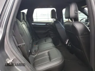 2016 Porsche Cayenne z VIN WP1AA2A21GKA10062, wystawiony jako Copart lot #64639685 z przebiegiem 52 962 mil mil oraz Szkoda całkowita • Salvage title. Historia ofert i sprzedaży dostępna na DreamBid. Obrazek 11.