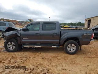 2013 Toyota Tacoma z VIN 5TFLU4EN2DX082131, wystawiony jako IAAI lot #41912420 z przebiegiem 195 334 mil mil oraz . Historia ofert i sprzedaży dostępna na DreamBid. Obrazek 14.