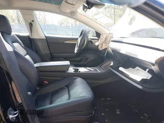 2023 Tesla Model 3 Long Range with VIN 5YJ3E1EB1PF392027, listed as a IAAI auction lot 41983638 with 31,415 mi miles and . Bid and sale history available at DreamBid. Image 5.