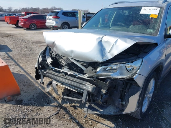 2011 Volkswagen Tiguan SE with VIN WVGBV7AX2BW562055, listed as a IAAI auction lot 41642084 with 175,407 mi miles and . Bid and sale history available at DreamBid. Image 6.