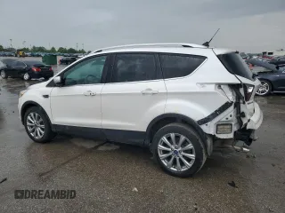 2018 Ford Escape Titanium z VIN 1FMCU9J94JUB49827, wystawiony jako Copart lot #55697385 z przebiegiem 98 682 mil mil oraz Szkoda całkowita • Salvage title. Historia ofert i sprzedaży dostępna na DreamBid. Obrazek 2.