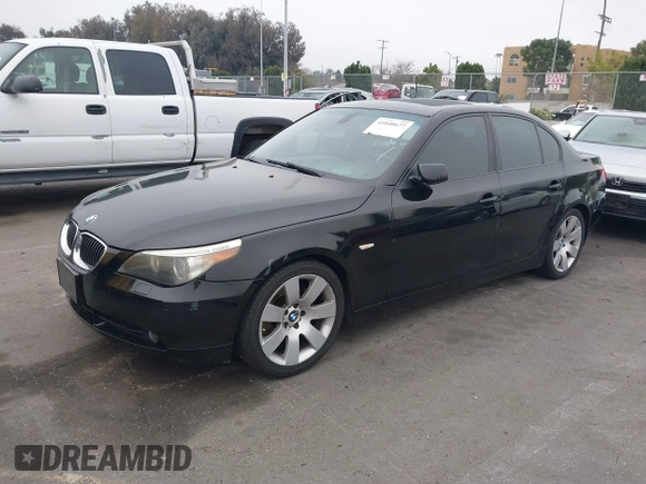 2007 BMW 5 Series 530i with VIN WBANE73517CM44520, listed as a IAAI auction lot 41840677 with 159,409 mi miles. Bid and sale history available at carsss.com. Image 2.