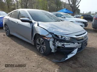 2018 Honda Civic Sedan LX with VIN 2HGFC2F5XJH573938, listed as a IAAI auction lot 42098109 with 69,037 mi miles. Bid and sale history available at carsss.com. Image 6.