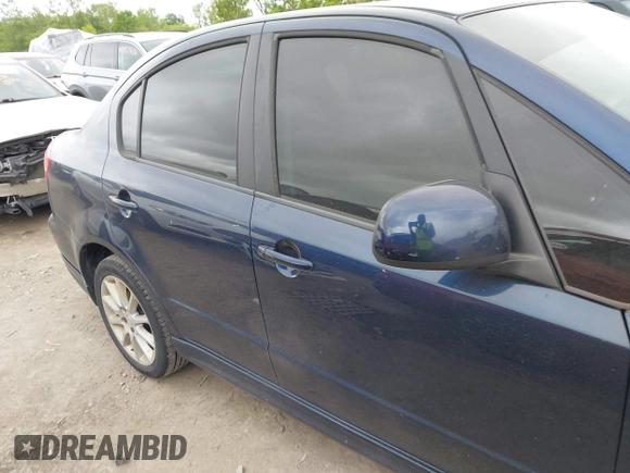 2009 Suzuki SX4 Sport FWD z VIN JS2YC414196200260, wystawiony jako IAAI lot #42354835 z przebiegiem 175 909 mil mil oraz . Historia ofert i sprzedaży dostępna na DreamBid. Obrazek 13.