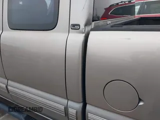 2000 Chevrolet Silverado 1500 with VIN 2GCEC19WXY1357051, listed as a IAAI auction lot 41535946 with 154,163 mi miles and . Bid and sale history available at DreamBid. Image 18.