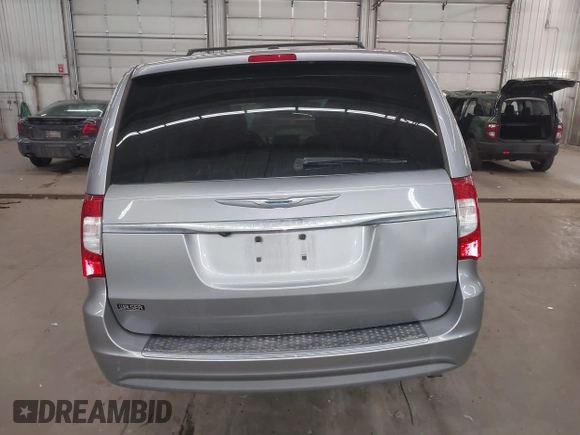 2013 Chrysler Town & Country Touring with VIN 2C4RC1BG9DR714736, listed as a IAAI auction lot 41824364 with 156,486 mi miles. Bid and sale history available at carsss.com. Image 17.