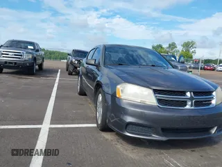 2014 Dodge Avenger SE with VIN 1C3CDZAB3EN219717, listed as a IAAI auction lot 42737543 with 157,362 mi miles and . Bid and sale history available at DreamBid. Image 1.