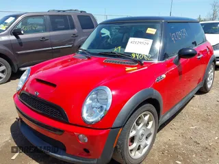 2003 MINI Hardtop S z VIN WMWRE33443TD60271, wystawiony jako IAAI lot #42129529 z przebiegiem 94 082 mil mil oraz . Historia ofert i sprzedaży dostępna na DreamBid. Obrazek 2.