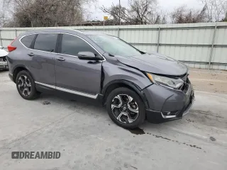 2017 Honda CR-V Touring with VIN 5J6RW2H97HL060219, listed as a Copart auction lot 45497645 with 144,724 mi miles and Salvage Title. Bid and sale history available at carsss.com. Image 4.