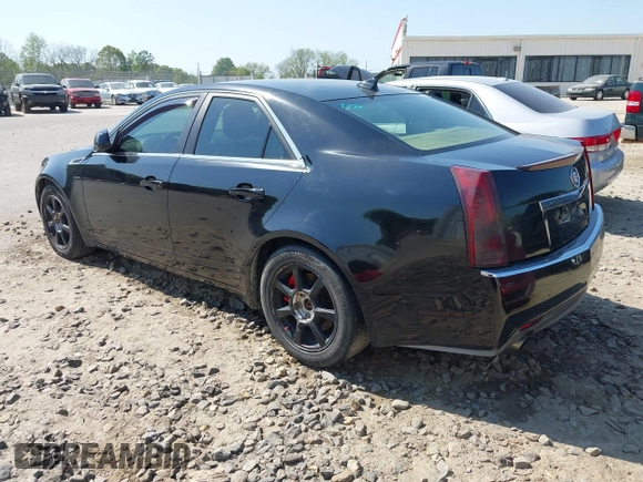 2009 Cadillac CTS RWD w/1SA with VIN 1G6DF577390128796, listed as a IAAI auction lot 42078153 with 257,757 mi miles. Bid and sale history available at carsss.com. Image 3.