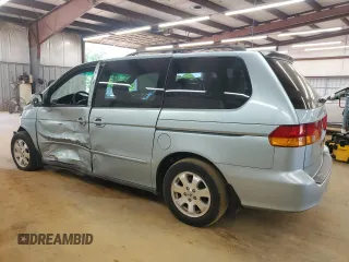 2004 Honda Odyssey EX-L z VIN 5FNRL18044B020316, wystawiony jako Copart lot #56027435 z przebiegiem 192 429 mil mil oraz Szkoda całkowita • Salvage title. Historia ofert i sprzedaży dostępna na DreamBid. Obrazek 2.