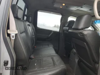 2005 Nissan Titan LE with VIN 1N6AA07B75N502911, listed as a Copart auction lot 47319305 with 208,218 mi miles and Clean Title. Bid and sale history available at carsss.com. Image 10.