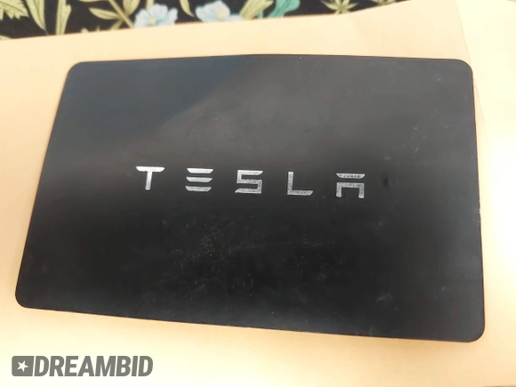 2022 Tesla Model Y Long Range with VIN 7SAYGDEE4NF428434, listed as a IAAI auction lot 41578503 with 35,460 mi miles and . Bid and sale history available at DreamBid. Image 11.