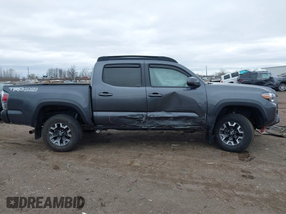 2021 Toyota Tacoma 4WD SR with VIN 3TMCZ5AN2MM406293, listed as a IAAI auction lot 41925585 with 52,243 mi miles. Bid and sale history available at carsss.com. Image 13.