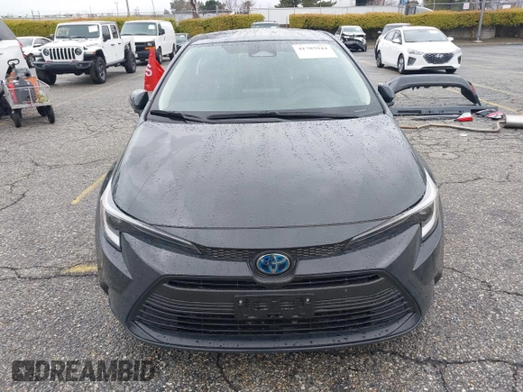 2023 Toyota Corolla Hybrid LE with VIN JTDBCMFE3P3020309, listed as a IAAI auction lot 41785944 with 19,617 mi miles. Bid and sale history available at carsss.com. Image 13.
