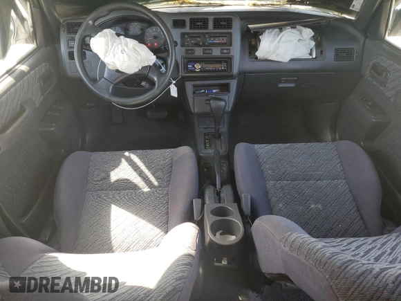 1999 Toyota RAV4 with VIN JT3GP10V5X7053634, listed as a Copart auction lot 52761695 with 236,443 mi miles and Salvage title. Bid and sale history available at DreamBid. Image 8.