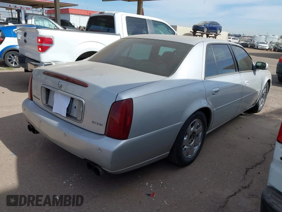 2002 Cadillac DeVille DTS with VIN 1G6KF57972U262315, listed as a IAAI auction lot 41537606 with 151,664 mi miles. Bid and sale history available at carsss.com. Image 4.