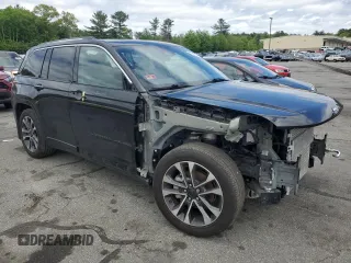 2022 Jeep Grand Cherokee Overland with VIN 1C4RJHDG0N8579025, listed as a Copart auction lot 57352245 with 47,194 mi miles and Salvage title. Bid and sale history available at DreamBid. Image 4.
