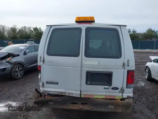 2009 Ford Econoline Cargo z VIN 1FTNE24L99DA19725, wystawiony jako IAAI lot #41652405 z przebiegiem Nie podano mil oraz . Historia ofert i sprzedaży dostępna na DreamBid. Obrazek 17.