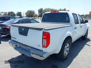 2013 Nissan Frontier SL with VIN 1N6AD0ER3DN734847, listed as a IAAI auction lot 42315412 with 114,471 mi miles and . Bid and sale history available at DreamBid. Image 4.