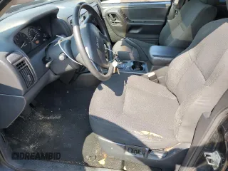 2004 Jeep Grand Cherokee Laredo z VIN 1J4GW48S24C217901, wystawiony jako Copart lot #60436675 z przebiegiem 263 837 mil mil oraz Szkoda całkowita • Salvage title. Historia ofert i sprzedaży dostępna na DreamBid. Obrazek 7.