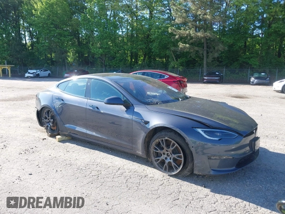 2022 Tesla Model S with VIN 5YJSA1E57NF479056, listed as a IAAI auction lot 42091009 with 78,272 mi miles and . Bid and sale history available at DreamBid. Image 1.