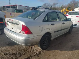 2001 Ford Focus LX with VIN 1FAFP33P21W309425, listed as a IAAI auction lot 41482071 with 86,943 mi miles and . Bid and sale history available at carsss.com. Image 4.