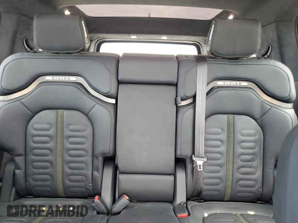 2022 Rivian R1S Launch Edition with VIN 7PDSGABL3NN000739, listed as a Copart auction lot 88127995 with 12,143 mi miles and Salvage Title. Bid and sale history available at DreamBid. Image 10.