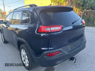 2016 Jeep Cherokee Altitude with VIN 1C4PJLAS7GW208431, listed as a Copart auction lot 61501525 with 126,107 mi miles and Salvage title. Bid and sale history available at DreamBid. Image 3.