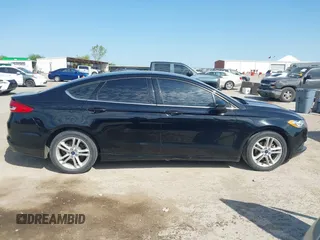 2018 Ford Fusion SE z VIN 3FA6P0H74JR125761, wystawiony jako IAAI lot #41992708 z przebiegiem 102 242 mil mil oraz . Historia ofert i sprzedaży dostępna na DreamBid. Obrazek 13.