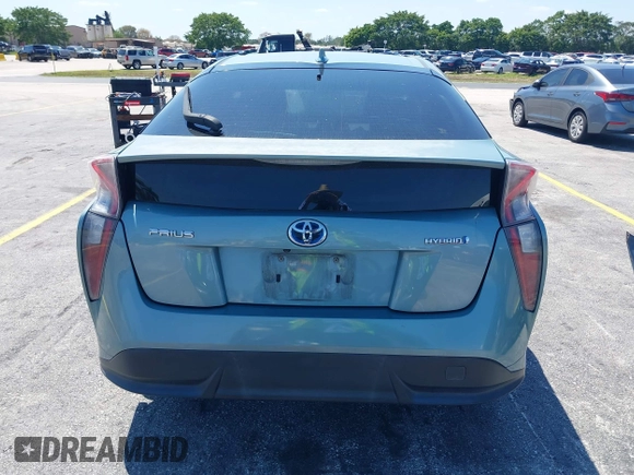 2016 Toyota Prius Four z VIN JTDKARFU0G3016597, wystawiony jako IAAI lot #42034214 z przebiegiem 125 799 mil mil oraz . Historia ofert i sprzedaży dostępna na DreamBid. Obrazek 16.