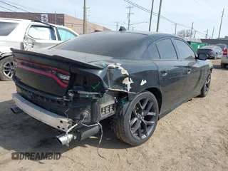2020 Dodge Charger R/T with VIN 2C3CDXCTXLH145129, listed as a IAAI auction lot 41769766 with 56,213 mi miles and . Bid and sale history available at carsss.com. Image 4.