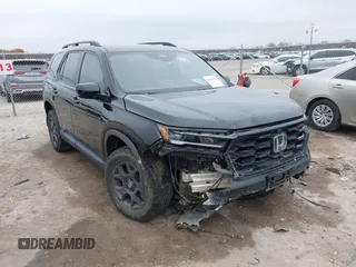 2023 Honda Pilot TrailSport with VIN 5FNYG1H63PB051646, listed as a IAAI auction lot 41069614 with 28,730 mi miles. Bid and sale history available at carsss.com. Image 1.