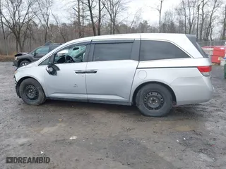 2015 Honda Odyssey LX with VIN 5FNRL5H26FB079654, listed as a IAAI auction lot 41983298 with 88,406 mi miles. Bid and sale history available at carsss.com. Image 14.