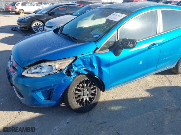 2012 Ford Fiesta SE with VIN 3FADP4EJ6CM131947, listed as a IAAI auction lot 41013636 with 148,195 mi miles. Bid and sale history available at carsss.com. Image 6.