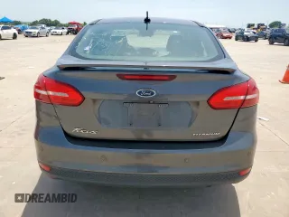 2017 Ford Focus Titanium with VIN 1FADP3J20HL253446, listed as a Copart auction lot 64196895 with 150,633 mi miles and Salvage title. Bid and sale history available at DreamBid. Image 6.