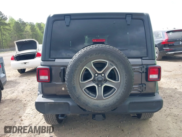 2018 Jeep Wrangler Unlimited Sport S z VIN 1C4HJXDG8JW112639, wystawiony jako IAAI lot #41951965 z przebiegiem 93 853 mil mil oraz . Historia ofert i sprzedaży dostępna na DreamBid. Obrazek 16.