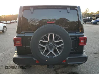 2024 Jeep Wrangler Sahara with VIN 1C4PJXENXRW118401, listed as a Copart auction lot 84731534 with 6,895 mi miles and Salvage Title. Bid and sale history available at DreamBid. Image 6.