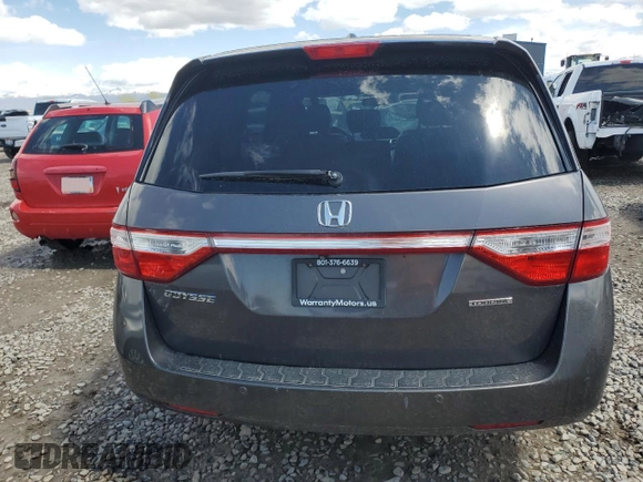 2012 Honda Odyssey Touring with VIN 5FNRL5H97CB070213, listed as a Copart auction lot 53558715 with 218,964 mi miles and Salvage title. Bid and sale history available at DreamBid. Image 6.