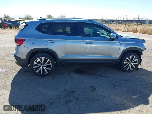 2024 Volkswagen Taos SE z VIN 3VVEX7B21RM001601, wystawiony jako IAAI lot #41406215 z przebiegiem 8 557 mil mil oraz . Historia ofert i sprzedaży dostępna na DreamBid. Obrazek 14.