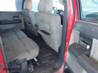 2004 Ford F-150 XLT with VIN 1FTPW14544FA27147, listed as a IAAI auction lot 41822740 with 157,925 mi miles. Bid and sale history available at carsss.com. Image 8.