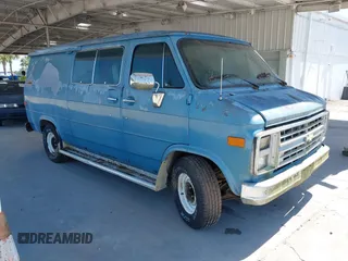 1989 Chevrolet Chevy Van z VIN 1GCEG25K3K7104404, wystawiony jako IAAI lot #42266335 z przebiegiem 96 272 mil mil oraz . Historia ofert i sprzedaży dostępna na DreamBid. Obrazek 1.