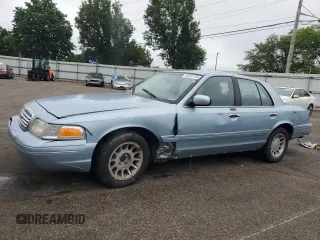 2002 Ford Crown Victoria LX z VIN 2FAFP74W62X107951, wystawiony jako Copart lot #58202135 z przebiegiem 118 197 mil mil oraz Szkody całkowita. Historia ofert i sprzedaży dostępna na DreamBid. Obrazek 1.