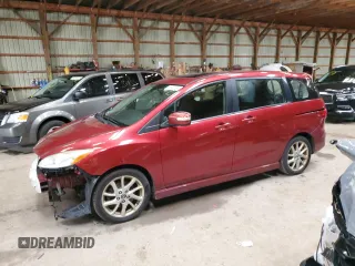 2014 Mazda 5 Grand Touring with VIN JM1CW2DLXE0172751, listed as a Copart auction lot 65447264 with 338,894 mi miles and Salvage Title. Bid and sale history available at DreamBid. Image 1.