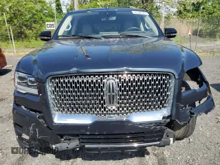 2022 Lincoln Navigator Reserve z VIN 5LMJJ2LT0NEL01129, wystawiony jako Copart lot #57594725 z przebiegiem 66 843 mil mil oraz Szkody całkowita. Historia ofert i sprzedaży dostępna na DreamBid. Obrazek 5.