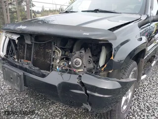 2004 Jeep Grand Cherokee Limited with VIN 1J8GW58N04C186548, listed as a IAAI auction lot 41949015 with 244,505 mi miles. Bid and sale history available at carsss.com. Image 6.