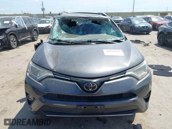 2018 Toyota RAV4 XLE z VIN 2T3WFREV8JW499399, wystawiony jako IAAI lot #42038421 z przebiegiem 77 411 mil mil oraz . Historia ofert i sprzedaży dostępna na DreamBid. Obrazek 11.