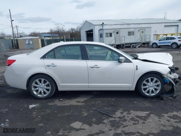 2011 Lincoln MKZ with VIN 3LNHL2GC2BR765716, listed as a IAAI auction lot 41620459 with 122,349 mi miles. Bid and sale history available at carsss.com. Image 13.
